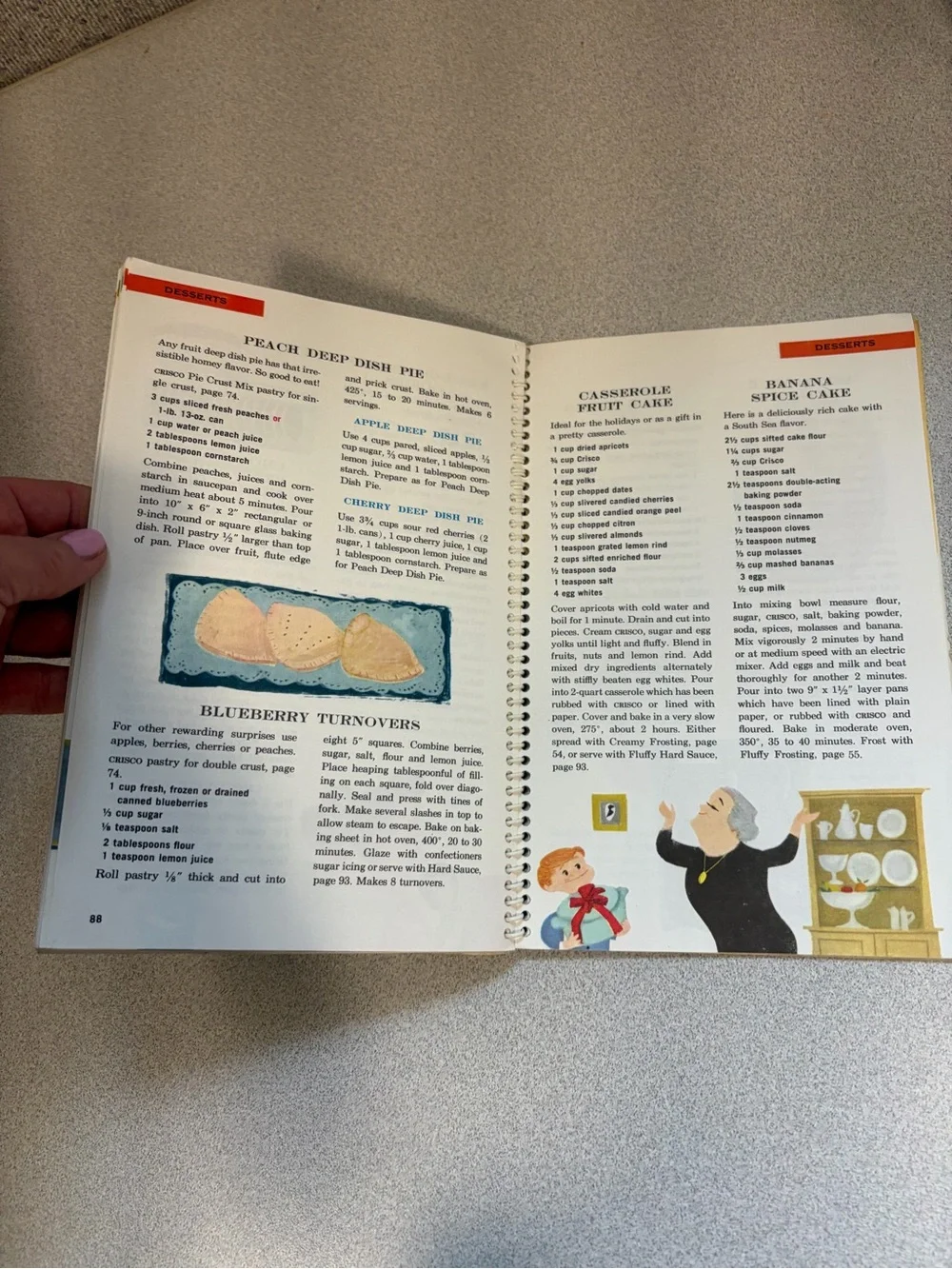 Cisco Cookbook with Bright Blue Cover and Red Polka-Dot Dress Illustration